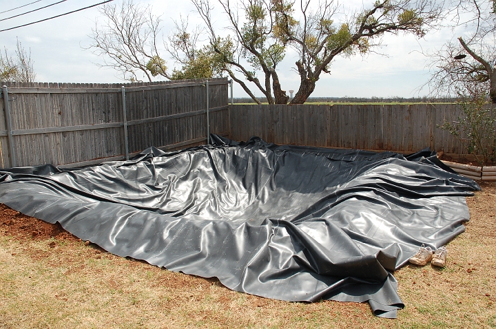 Pond liner in hole.jpg